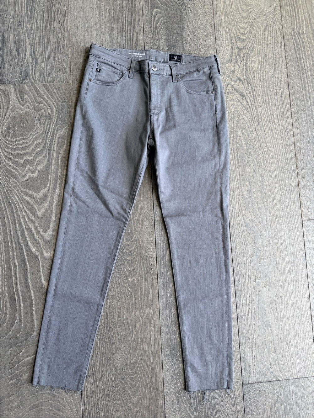 AG Jeans AG Adriano Goldschmied The Legging Ankle Raw Hem in Gray Size 29
